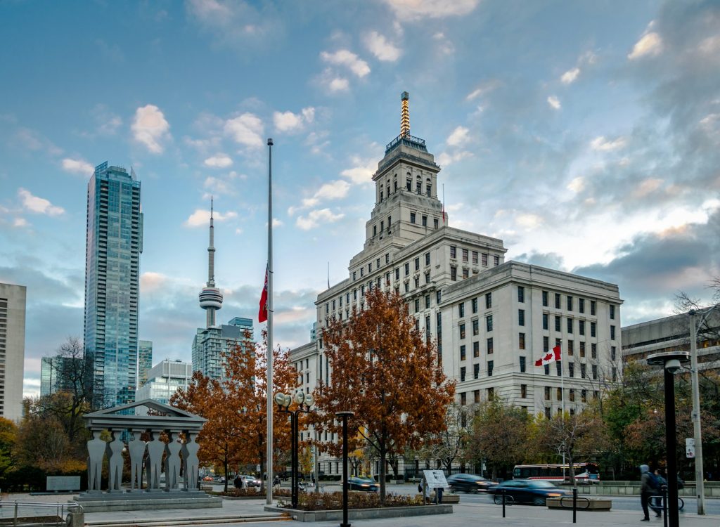 Buildings in Downtown Toronto with CN Tower and Autumn vegetation - Toronto, Ontario, Canada