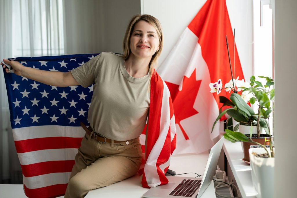 Student at desk studying free online American university academic course during global Covid 19