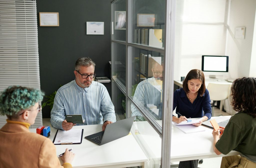 People sitting in visa center